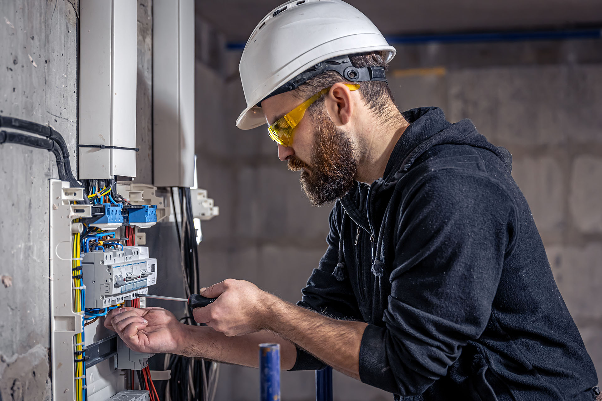 Electrician working with wiring system